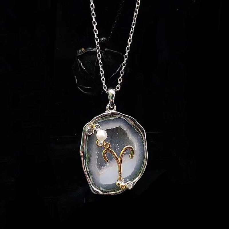 Aries crystal geode zodiac pendant with Aries symbol, front view
