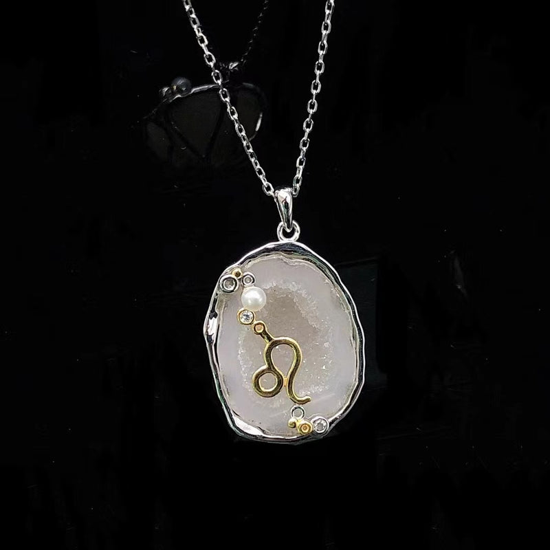 Leo crystal geode zodiac pendant with Leo symbol, front view