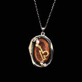 Libra crystal geode zodiac pendant with Libra symbol, front view