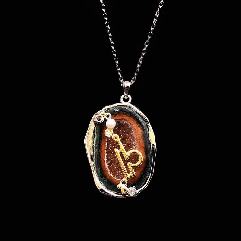 Libra crystal geode zodiac pendant with Libra symbol, front view
