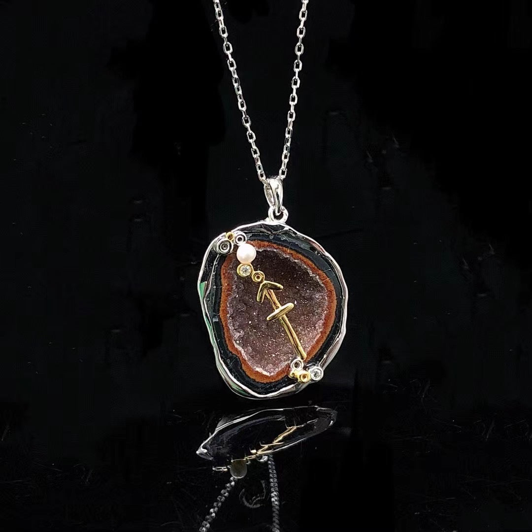 Sagittarius crystal geode zodiac pendant with Sagittarius symbol, front view