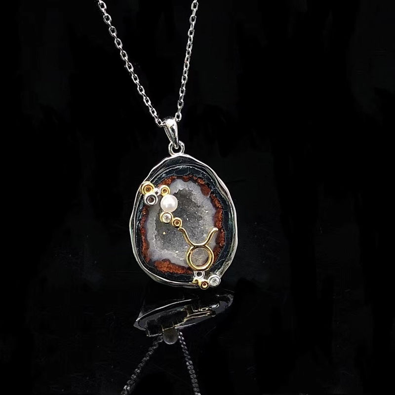 Taurus crystal geode zodiac pendant with Taurus symbol, front view