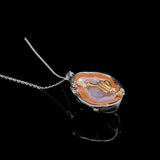 Virgo crystal geode zodiac pendant with Virgo symbol, angled view